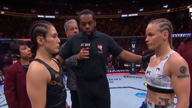 Alexa Grasso and Valentina Shevchenko stare down during their Noche UFC main event title fight.
